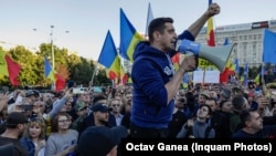 George Simion, leader of the far-right Alliance for the Unification of Romania, pictured leading a protest in 2022, falsely claimed on October 17 that Romania had evacuated 3,000 Ukrainians from Israel but "no Romanians," in a social media post that went viral.