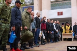 Mobilized men assemble in the Russian town of Bataisk in September.