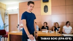 An 18-year-old man casts his vote during European elections in Kozarmisleny, Hungary, in May 2019.