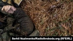 The body of a Russian soldier on the street of the liberated village of Nova Basan in the Chernihiv region on April 1.