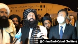 A September 29 press conference at Kabul airport following the delivery of Chinese aid to the new Taliban government.