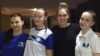 (Left to right) Kristina Stanojevic, Aldijana Salihovic, coach Kristina Marinkovic, and Merjema Pestalic