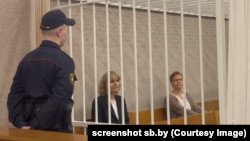 Lyudmila Chekina (left) and Maryna Zolatava in court in Minsk on January 9.