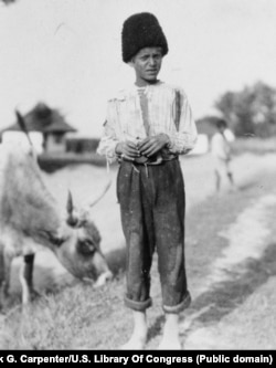 Nothing to do all day but watch a cow. That is the job of this Romanian peasant boy. It is during the long hours that he plays his flute and learns the songs of the birds.