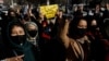 Afghan women chant slogans in protest at the closure of universities to women by the Taliban in Kabul in December 2022.