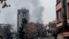 Smoke rises from a site of an attack at Shahr-e Naw which is one of the main commercial areas in Kabul, in December 2022.