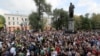 People attend a rally to demand that opposition candidates be allowed to run in upcoming local elections in Moscow in August 2019.