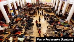 Protesters rest in Kyiv's City Hall, December 5.