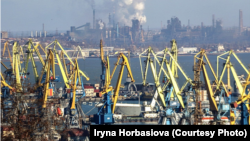 The port of Mariupol, with its vast steelworks in the background
