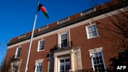 The Afghan Embassy in Washington, which still flies the black-red-and-green tricolor flag. (file photo)