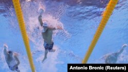 Swimmers compete in the men's 200-meter freestyle semifinal at the FINA World Championships in Budapest in June 2022.