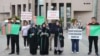 Turkmen citizens protest against the Turkmen authorities outside their country's embassy in Istanbul.