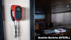 .A telephone in the empty reception area of Hotel Molika