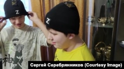 In a Telegram post, the mayor of the southern Siberian city of Bratsk, Sergei Serebrennikov, was shown handing out black ski caps emblazoned with the Z symbol to all the children.