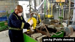 A Kumtor mine worker during a visit by members of a government commission and Akylbek Japarov, head of the Kyrgyz cabinet of ministers, in January.