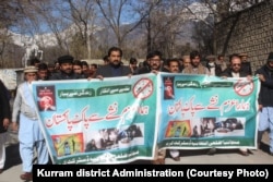 People march in an antidrug campaign in the Kurram district of Khyber Pakhtunkhwa in January.