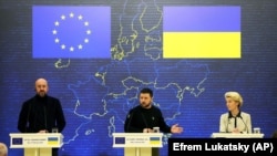 Ukrainian President Volodymyr Zelenskiy (center), European Council President Charles Michel (left), and European Commission President Ursula von der Leyen give a joint press conference after a EU-Ukraine summit on February 3 in Kyiv, where the country's efforts to tackle graft were high on the agenda. 