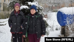 Avhustyna Psevdaklyayeva, 67 (left), and Lyudmyla Zhovnyrenko, 52, live in a basement in Hulyapole. "This silence makes me afraid.… What will come after it?" asks Psevdaklyayeva. 