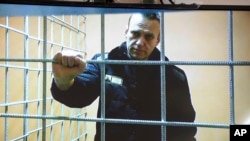 Russian opposition leader Aleksei Navalny speaks from prison via a video link in Petushki, Russia, in January.