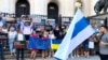 Supporters of Aleksei Alchin gather outside the Varna courthouse on August 23. Alchin filed a request for political asylum after Bulgarian authorities detained him in early August.