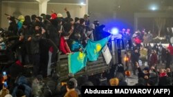 Protesters take part in a rally over a hike in energy prices in Almaty on January 5.