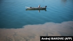 This October 2019 photo shows wastewater pouring into the Sava River in Belgrade. According to Serbia’s Environmental Protection Agency, slightly more than a third of households in Serbia are without access to sewage and water-management systems.