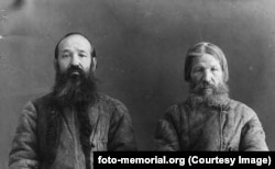 A priest (left) and a peasant after their arrest in 1932 by the NKVD, the Soviet secret police, for allegedly opposing the collectivization of the farming and logging industries in the northern Komi region.