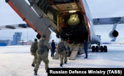 Russian airborne troops bound for Kazakhstan board a transport plane at an airfield northeast of Moscow on January 6.