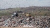 Crows fly above the massive state owned landfill of Mirash in Kosovo.