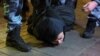 Russian police officers detain a man during an opposition rally in Moscow. (file photo)