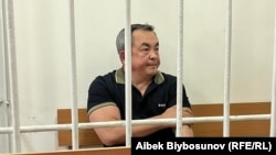 Tengiz Bolturuk sits in court in Bishkek in September 2022.