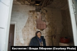 An elderly man stands amid the remnants of his destroyed house in Shevchenkove in a liberated part of the Kharkiv region.