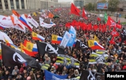 People attend a rally to demand the release of protesters who were detained during opposition demonstrations for fair elections in Moscow, on September 29.