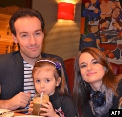 Yoann Barbereau with his then-wife, Darya Nikolenko, and their daugher Eloise in a photo taken on December 31, 2012