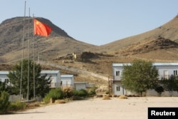 The Chinese flag flies near miners' housing facilities at the Mes Aynak copper mine, which has been leased by a consortium of state-owned Chinese mining companies. (file photo)