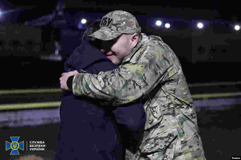 Ukraine&#39;s State Security Service chief, Vasyl Maliuk (right), embraces a prisoner of war released in the swap with Russia after a group of prisoners was set free in the Chernihiv region. &nbsp;