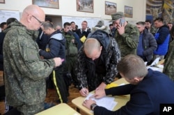 Recruits gather at a military recruitment center of Bataysk, Rostov-on-Don region, Russia, on September 26, 2022.