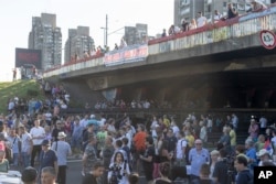 Protesters block traffic on the main highway passing through Belgrade, Serbia, Protesters and opposition activists stop traffic in several places around the country in June, following weeks of anti-government protests that drew tens of thousands to the streets after two back-to-back mass shootings in early May.