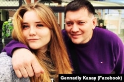 Hennadiy Kasai (right) and his daughter Polina