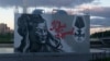 Protest Portrait Of Convicted Murderer Appears Near St. Petersburg Bridge