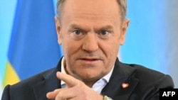 Polish Prime Minister Donald Tusk speaking in Warsaw on January 15