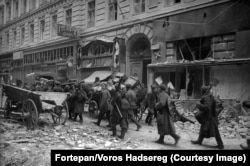 Red Army soldiers advancing into central Budapest.