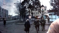 Women walk on Lenin Avenue