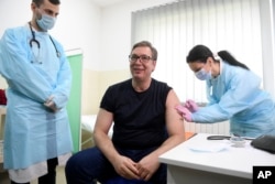 Serbian President Aleksandar Vucic receives a dose of the Chinese Sinopharm vaccine in April.