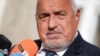 Boyko Borisov, former Bulgarian prime minister and leader of the center-right GERB party, speaks to members of the media after casting his vote at a polling station in Sofia on October 27.