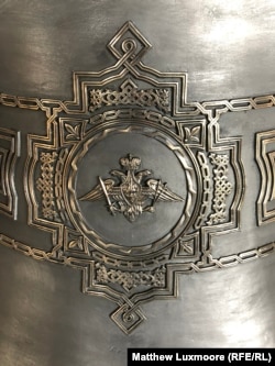 The emblem of the Russian armed forces' Strategic Missile Troops on a bell at the Anisimov bell foundry destined for the Armed Forces Cathedral