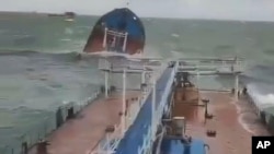 This photo taken from a video released by the Russian Southern Transport Prosecutor's Office, shows the Volgoneft 212 tanker wrecked by a storm in the Kerch Strait on December 15.