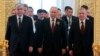 Kazakh President Qasym-Zhomart Toqaev (left to right), Russian President Vladimir Putin, and Uzbek President Shavkat Mirziyoev arrive for a working breakfast of the leaders of the Commonwealth of Independent States in Moscow in May 2023.