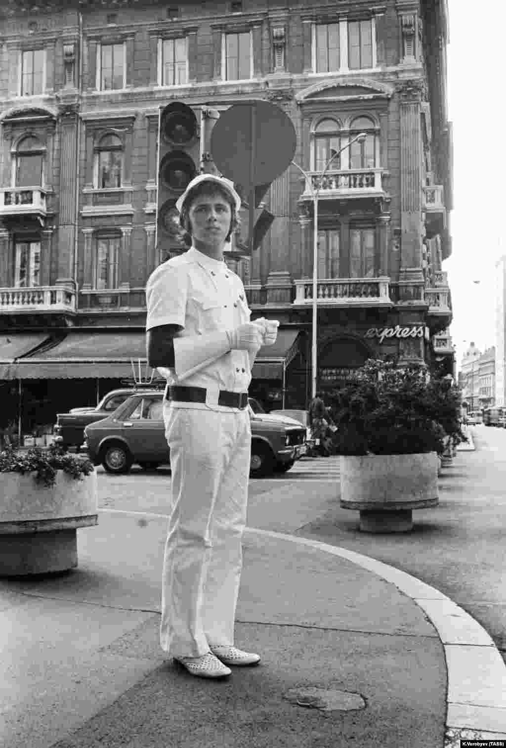 A member of the &ldquo;volunteer youth squad&rdquo; on duty in Rijeka, Croatia, as he &ldquo;monitors public order&rdquo; in 1975.