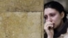 A woman weeps at the Park Kultury subway station in Moscow on March 30, 2010.